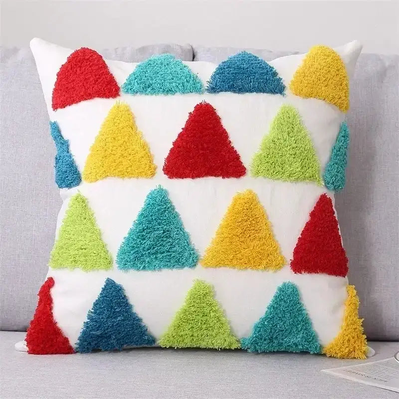 Colorful plush cushion cover with geometric tufted tassel pattern in red yellow teal and lime green for decorbites decor