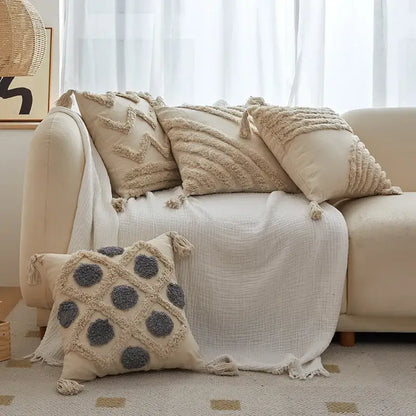 Beige cushion cover with gray geometric tufted tassel embroidery and tassel trim for living room decor
