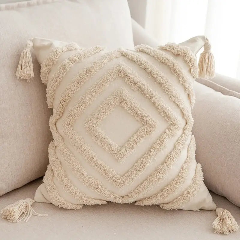 Cream-colored cotton linen geometric tufted tassel pillowcase with textured fringed diamond pattern for living room decor