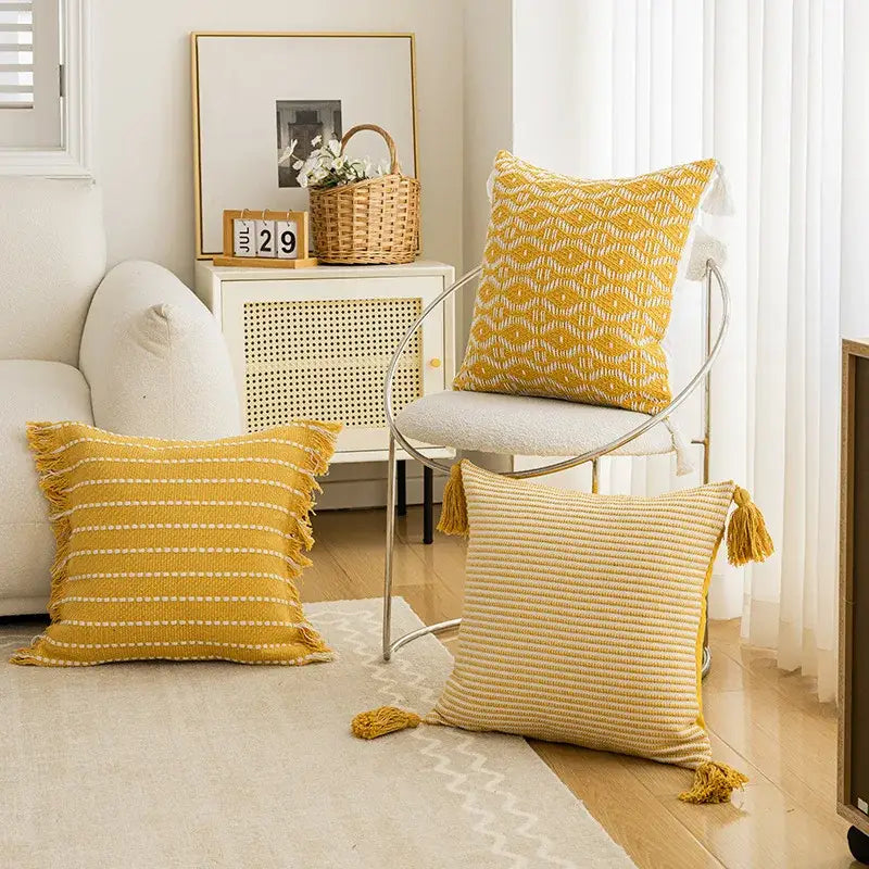 Yellow geometric tufted cushion cover with textured woven pattern and crochet tassels for living room decorbites decor