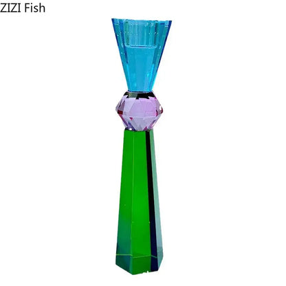 A vibrant multi-colored crystal candle holder with a faceted purple gemstone center and green tapered base for dining room use