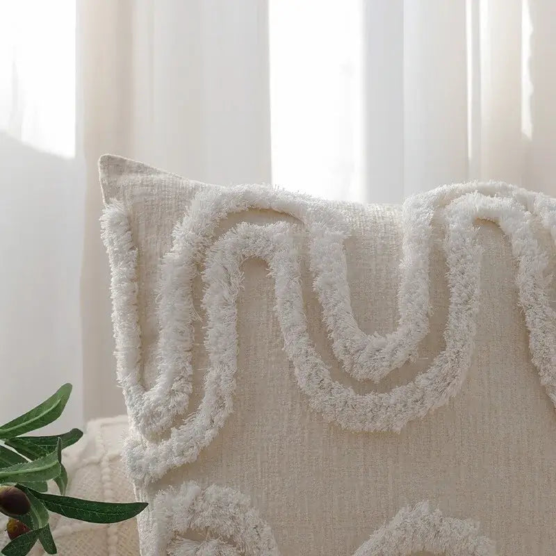 Cream-colored pillow cover with textured fringed design featuring decorbites geometric waves tufted pattern for bedroom decor