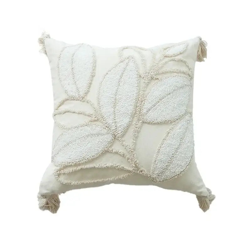 Cream-colored square pillow cover with textured leaf embroidery tassels and decorbites geometric waves tufted design