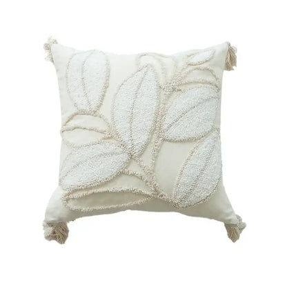 Cream-colored square pillow cover with textured leaf embroidery tassels and decorbites geometric waves tufted design