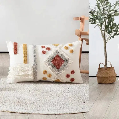 White rectangular pillow with textured tufted geometric waves in terracotta and mustard yellow accents pillow covers decorbites geometric waves