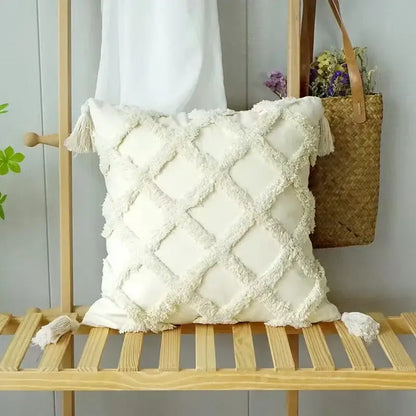 Cream-colored geometric waves tufted pillow cover with textured diamond pattern and fringed tassels for decorbites decor