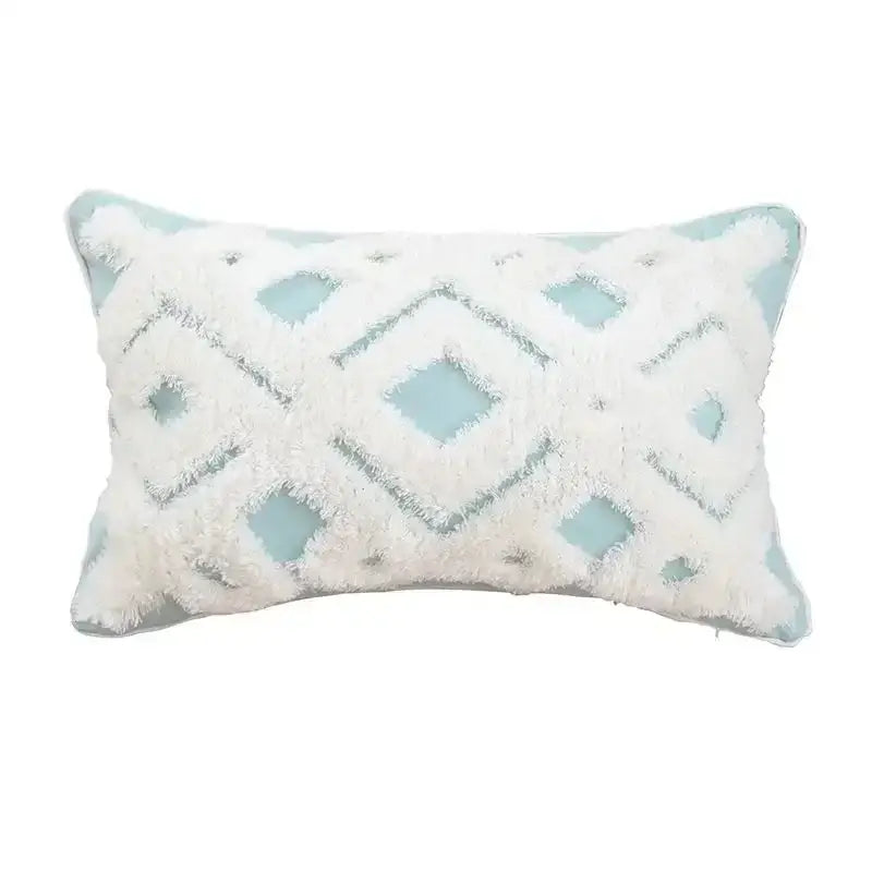 A rectangular cream pillow cover with soft fluffy texture and light blue geometric waves tufted design decorbites pillow covers