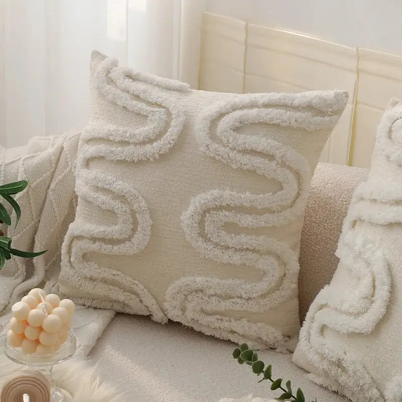 Cream-colored pillow cover with textured wavy fringe in plush fabric for decorbites geometric waves tufted decor