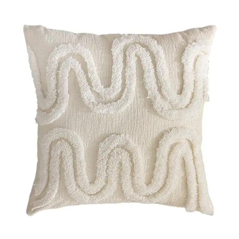 Cream-colored pillow cover with textured wavy embroidered patterns in soft plush fabric for decorbites geometric waves tufted decor