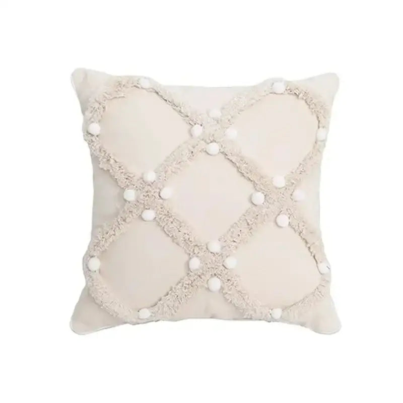 Cream-colored geometric waves tufted pillow cover with textured fringe and white pom-poms for stylish decorbites pillow covers