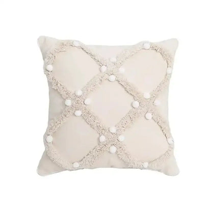 Cream-colored geometric waves tufted pillow cover with textured fringe and white pom-poms for stylish decorbites pillow covers