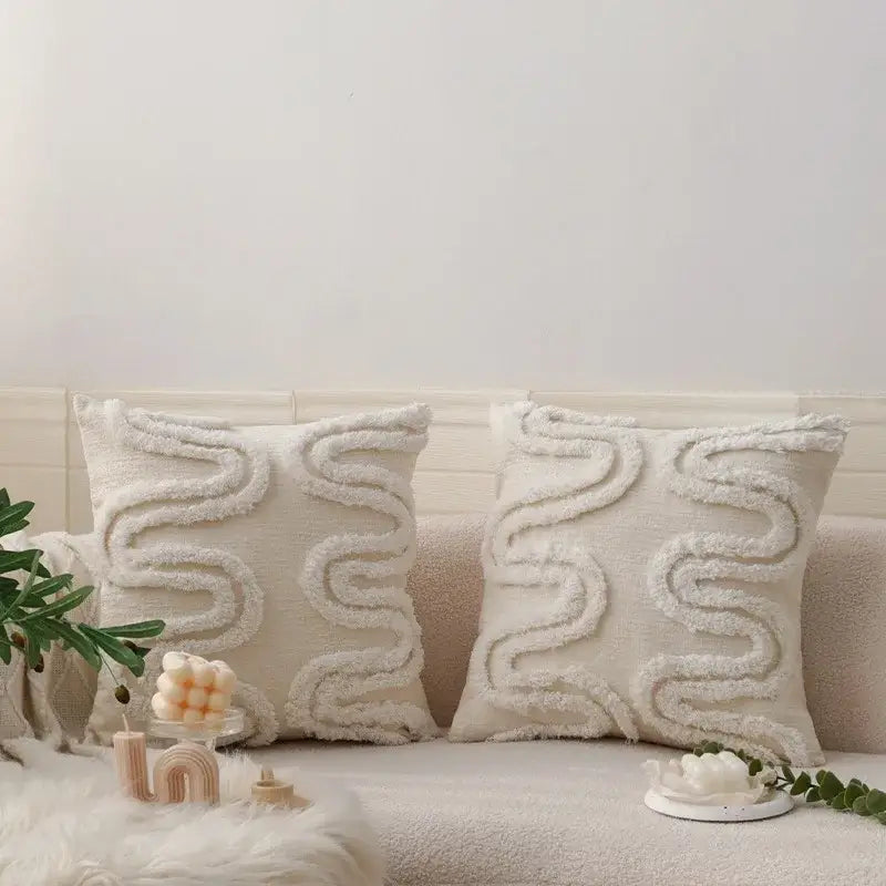 Cream-colored geometric waves tufted pillow covers with textured wavy fringe detail for stylish bedroom decorbites decor