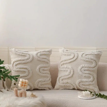 Cream-colored geometric waves tufted pillow covers with textured wavy fringe detail for stylish bedroom decorbites decor