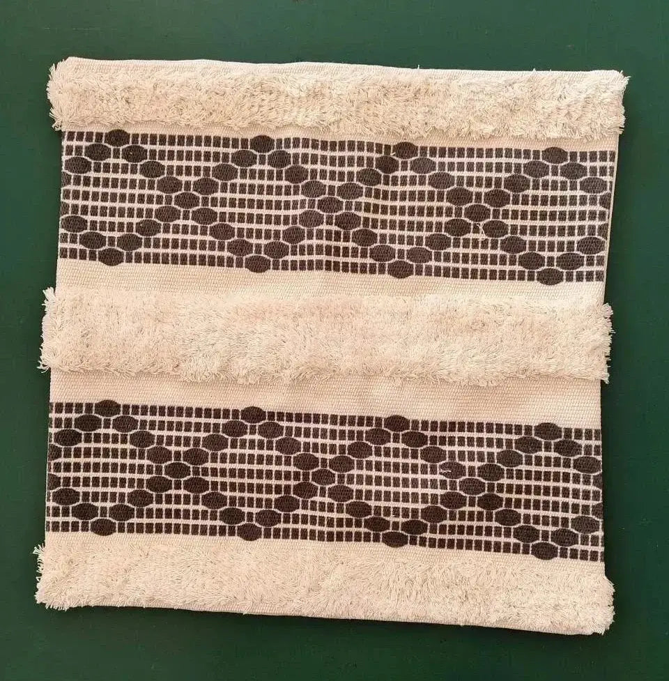 Beige towel with frayed edges and dark brown geometric waves tufted bands for decorbites geometric waves pillow covers
