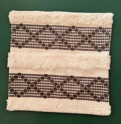Beige towel with frayed edges and dark brown geometric waves tufted bands for decorbites geometric waves pillow covers