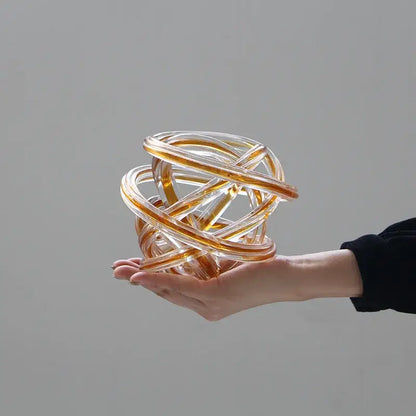Translucent amber and clear glass geometric wound twine sphere decorbites geometric wound glass living room decor