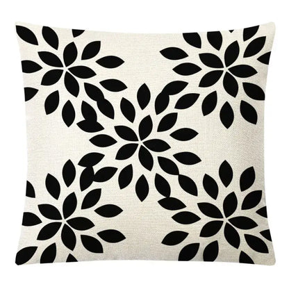 Beige linen throw pillow with bold black floral pattern complementing decorbites geometric yellow linen pillow cover set