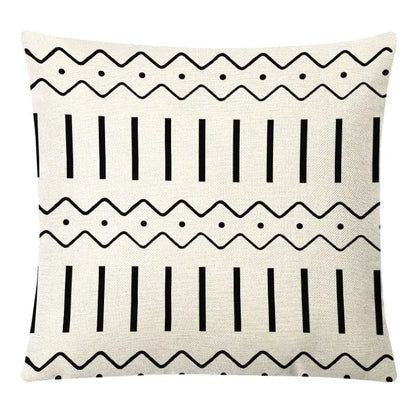 Cream-colored linen throw pillow cover with bold black geometric patterns for decorbites geometric yellow autumnal decor
