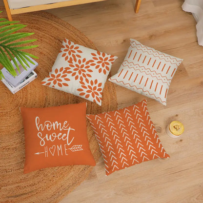 Set of four orange and white geometric yellow linen pillow covers with floral script designs for autumnal decorbites living room decor
