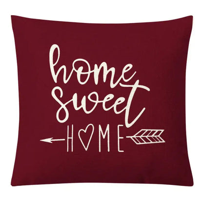 Maroon pillow cover with home sweet home white cursive script and arrow design complementing decorbites geometric yellow linen set