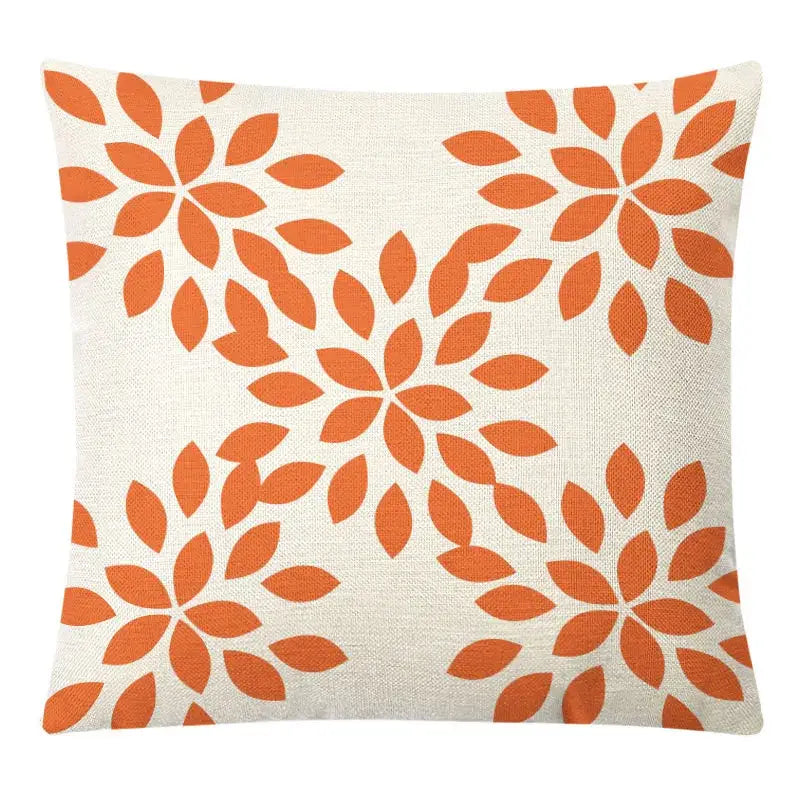 Cream-colored linen pillow cover with orange stylized flowers for decorbites geometric yellow autumnal decor
