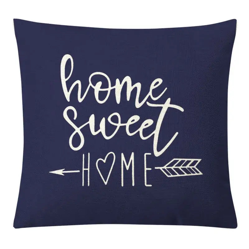 Navy blue pillow cover with white home sweet home text and arrows complements decorbites geometric yellow linen set