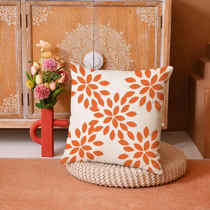 Cream-colored pillow cover featuring a repeating orange stylized flower pattern in decorbites geometric yellow linen set