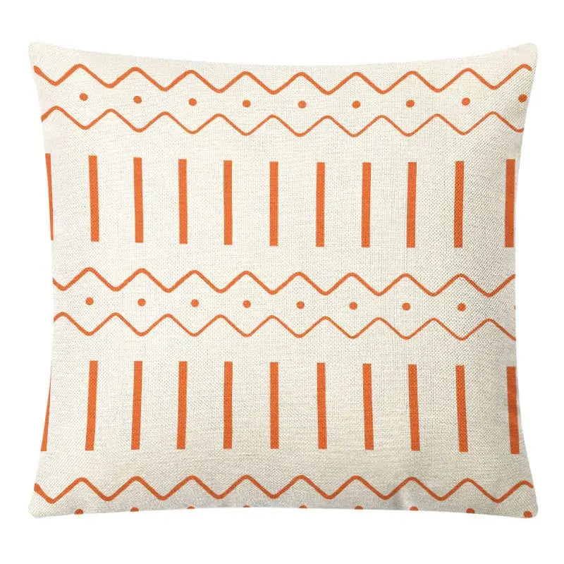 Cream-colored pillow cover with orange geometric patterns in decorbites geometric yellow linen set for autumnal decor