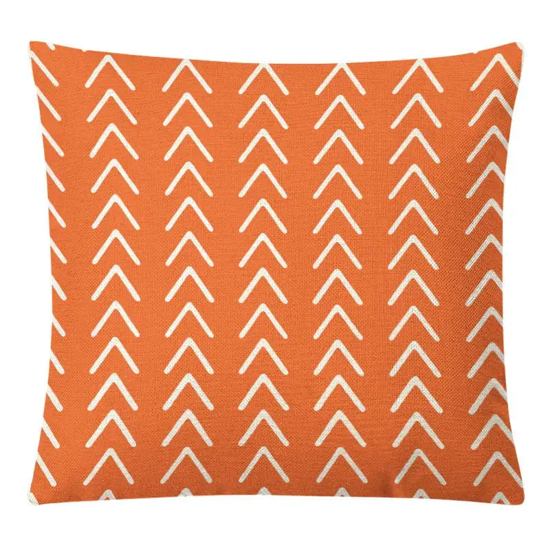 Orange throw pillow with white chevron pattern in geometric yellow linen pillow cover set for autumnal living room decorbites decor