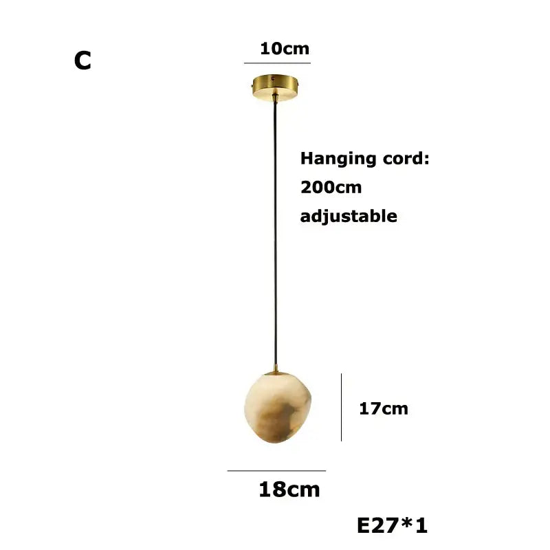 A geometry marble led chandelier with a spherical matte beige and cream marble shade for kitchen island decor