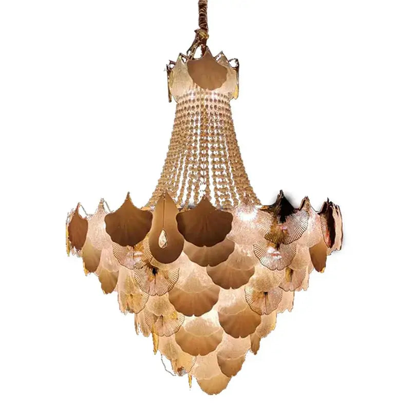 A decorbites ginkgo art deco gold and white dimmable chandelier with amber glass leaves and crystal accents for dining room decor