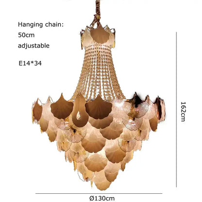 Elegant gold-toned dimmable chandelier with cascading ginkgo leaf glass panels and crystal beads by decorbites ginkgo art