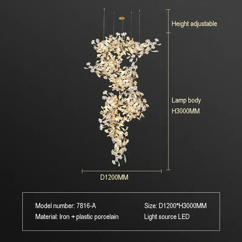 A modern height-adjustable ginkgo biloba chandelier pendant light with golden and white porcelain flowers for living room decor