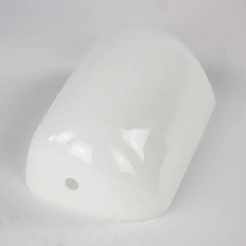 A smooth white translucent ceramic lamp shade for decorbites glass banker lamp with a rounded rectangular shape