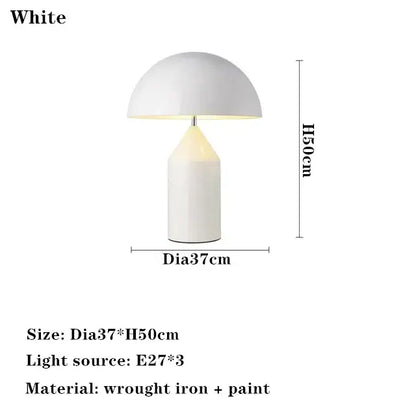 White mushroom-shaped table lamp with sleek wrought iron design in glossy black and gold for decorbites atollo bedroom