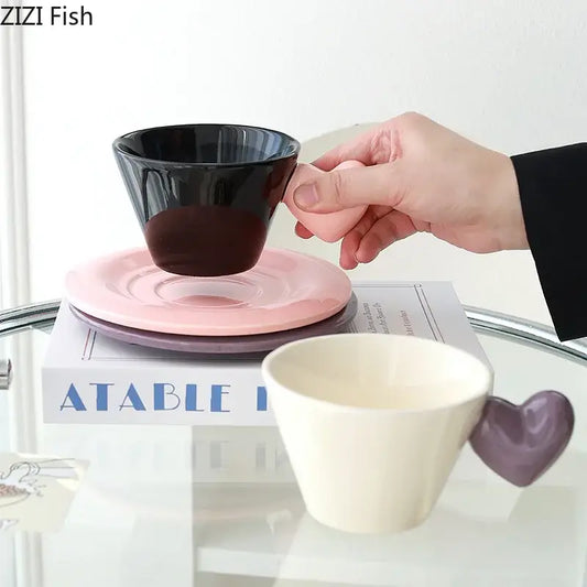 Glossy black porcelain lovers mug with a wide flared rim in a heart shape lovers mug set for dining room use