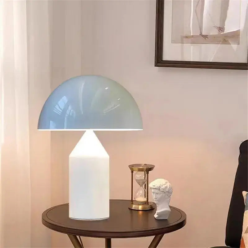 A sleek mushroom lamp with a glossy light blue dome and matte white base perfect for bedroom decorbites atollo black white