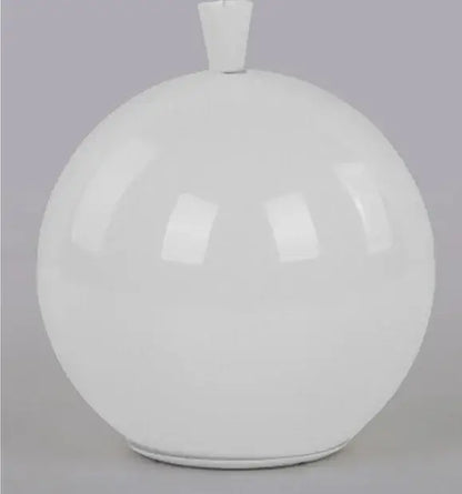 White glossy ceramic vase with rounded body and small rectangular neck displayed alongside a colorful balloon ceiling lamp for kids bedroom