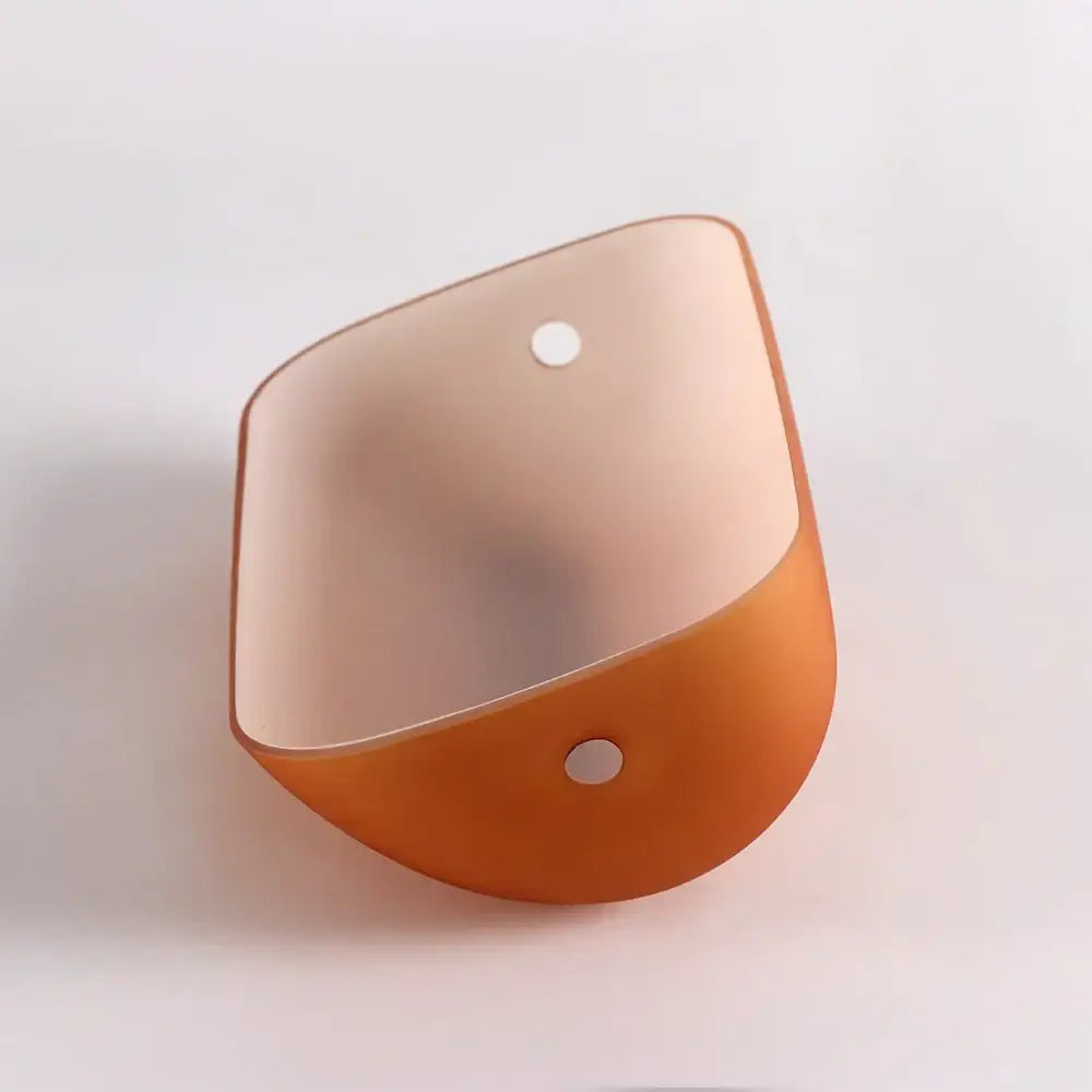 Orange translucent wall-mounted plant holder with two circular holes for decorbites glass banker lamp cover use