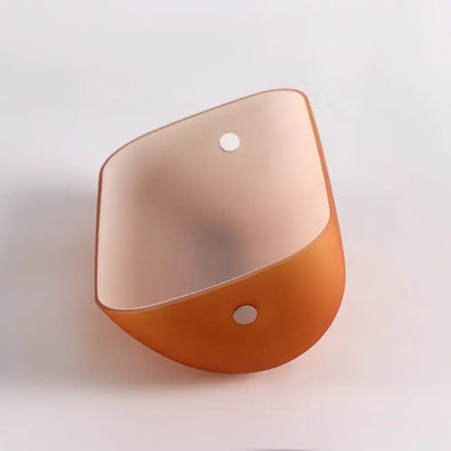 Orange translucent wall-mounted plant holder with two circular holes for decorbites glass banker lamp cover use