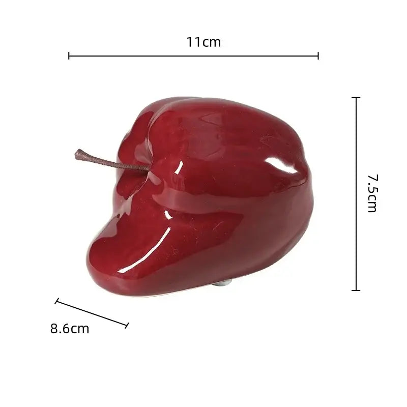 Glossy deep red ceramic abstract melting apple sculpture with brown stem decorbites melting apple living room decor