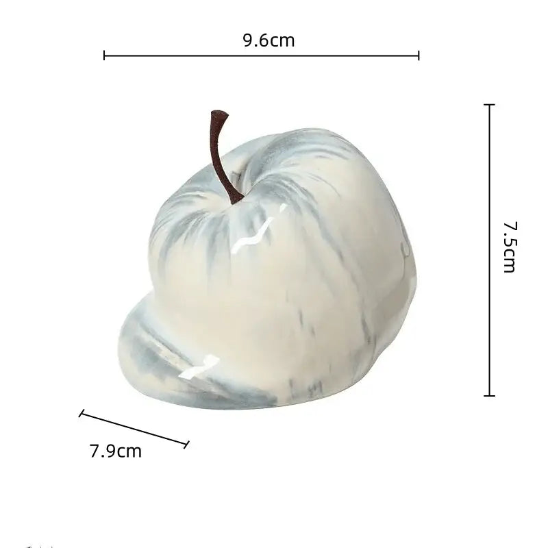 Glossy white and gray marbled ceramic melting apple figurine with brown stem for decorbites abstract melting apple decor