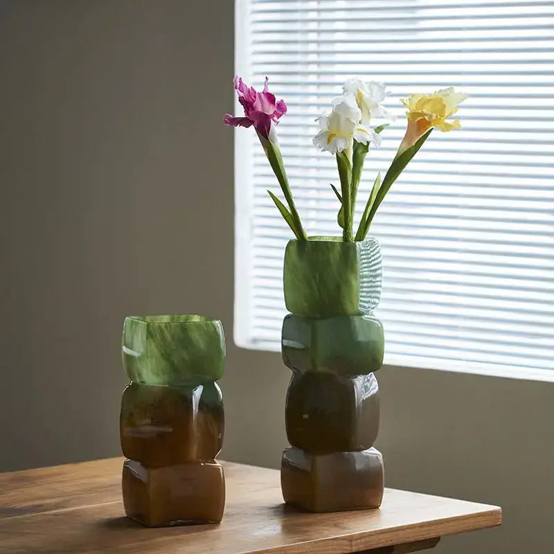 Two stacked green glass geometric square vases with marbled and striped accents for decorbites square vase table decor