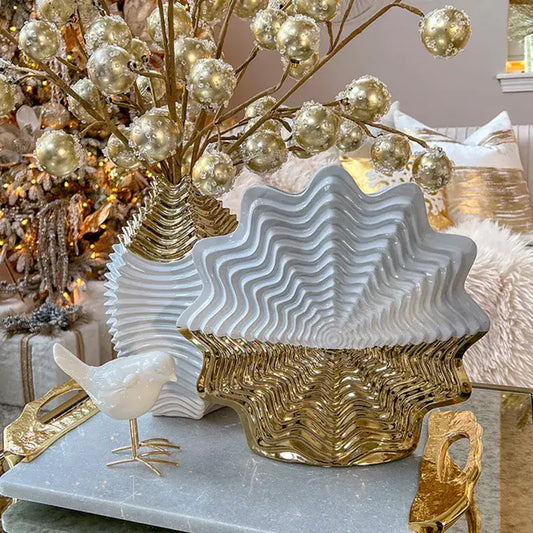 Glossy white and gold shell-shaped ceramic vase with wavy fringe geometry texture for living room decorbites decor