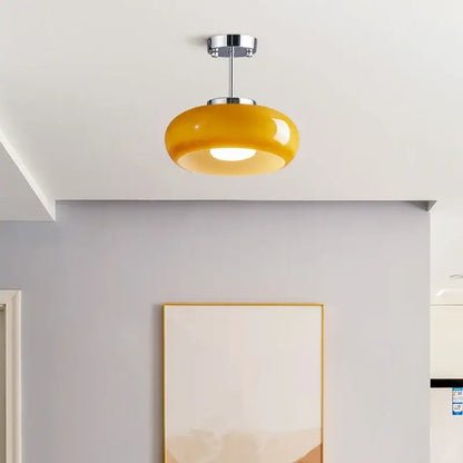 Glossy yellow amber glass led pendant light with sleek chrome fixture ideal for kitchen or dining room pendant lights