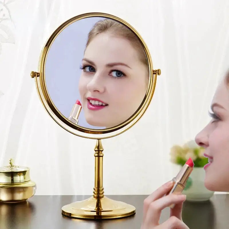 Gold and black adjustable wall mounted cosmetic mirror with gold framed round vanity mirror and standing pedestal base