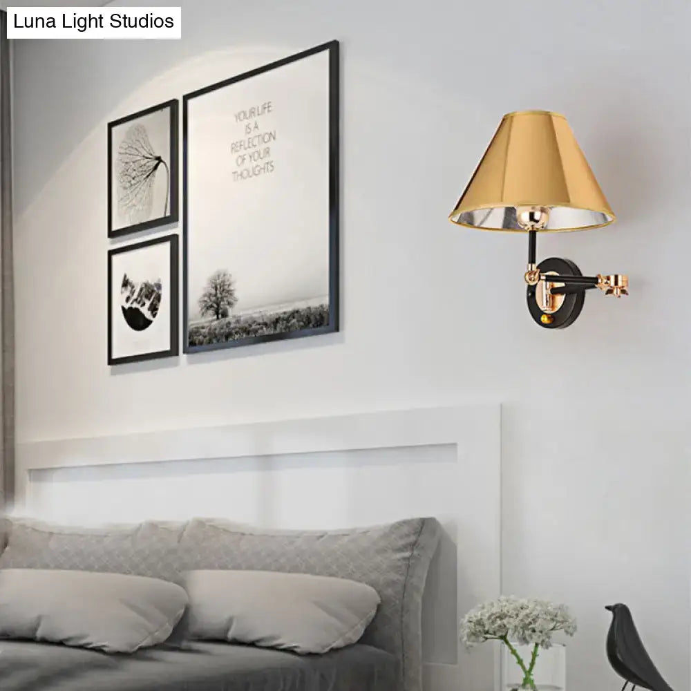 Gold and black metal cone wall light swing arm bedroom sconce with gold-toned adjustable cone shade and black mounting base