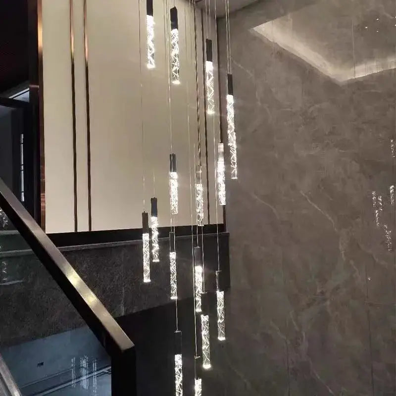 Modern gold and crystal led chandelier with sleek black caps and intricate patterns for staircase living room decorbites crystal led