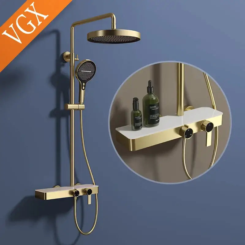Gold and marble bathroom shower set with gold-finished shower set, round rainfall head, handheld spray, and integrated shelf