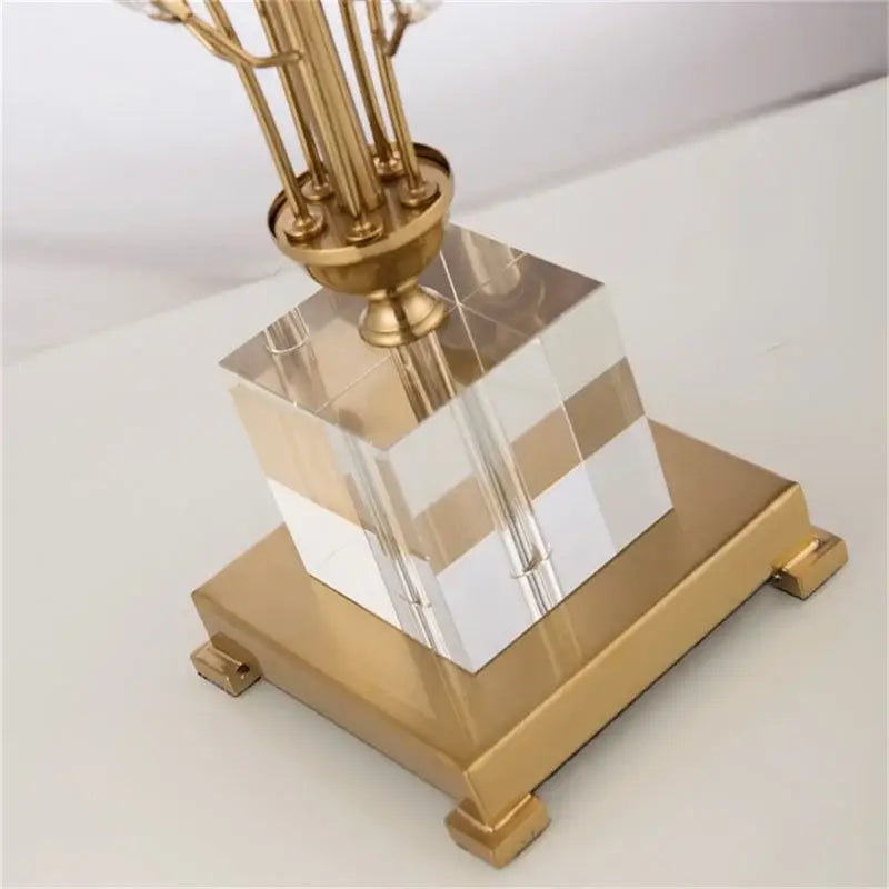 Gold and silver crystal branch led desk lamp with gold-toned metal base and acrylic cube centerpiece featuring stripes